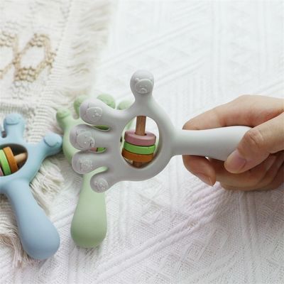 Weiches Baby-Silicon-Zähne Ratteln Handflächenform-Spielzeug: BPA-frei, ungiftig, kaubar