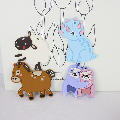 Buntes Baby personifiziertes Silikon Beißring mit Schaf-Pferd Dino Shape