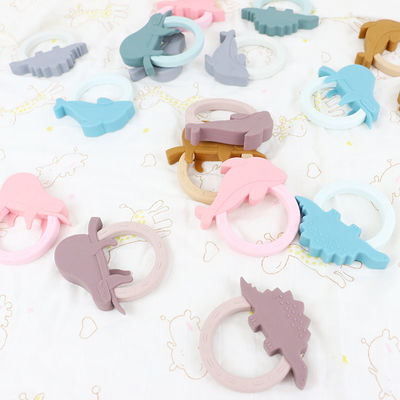 Form Karikatur-Silikon-Baby Beißring Toy With Penguin Unicorn Raccoon