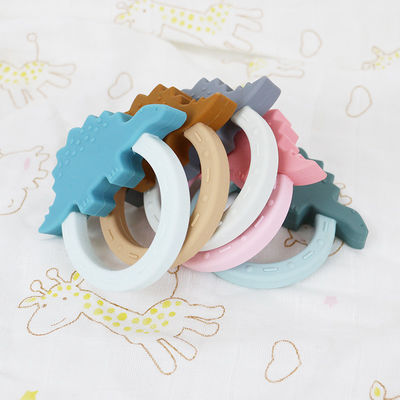 Form Karikatur-Silikon-Baby Beißring Toy With Penguin Unicorn Raccoon
