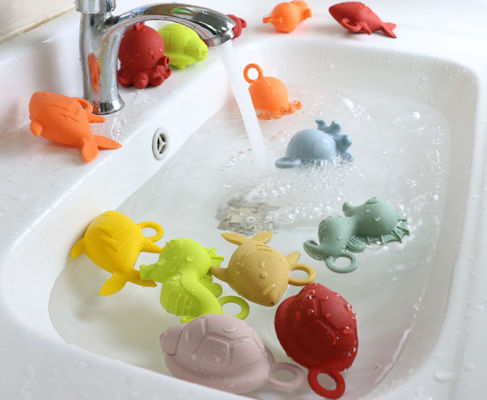 Glänzende Farbspielt gummibaby-Silikon BPA, das für das Baby-Wasser-Schwimmen frei ist
