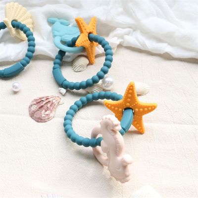 Lebensmittelqualität Silikon Baby-Zähne mit nicht-toxischem Design und leicht zu greifen Griff BPA-freie Silikon-Zähneringe