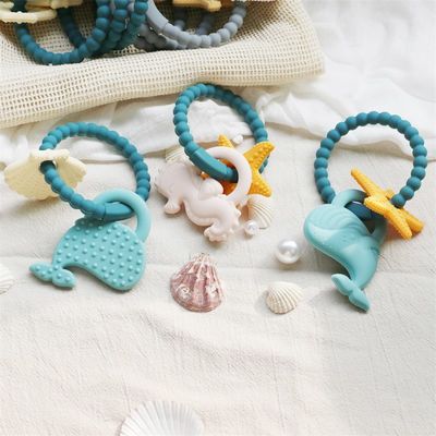 Lebensmittelqualität Silikon Baby-Zähne mit nicht-toxischem Design und leicht zu greifen Griff BPA-freie Silikon-Zähneringe